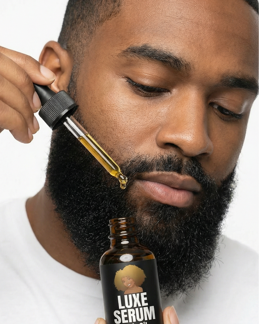 Man with a full beard applying Organic Hair Growth Serum with the dropper